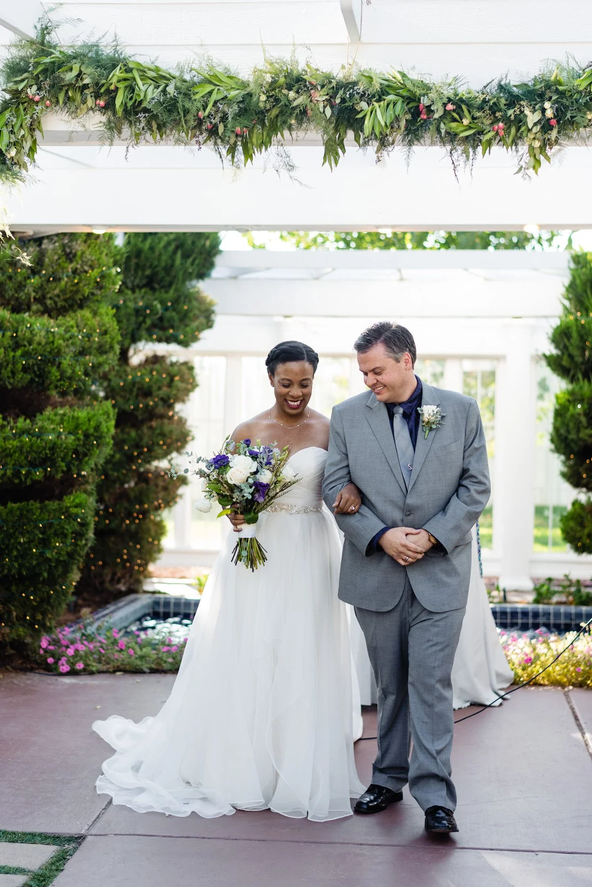 bride and groom retreat down aisle after Colorado wedding