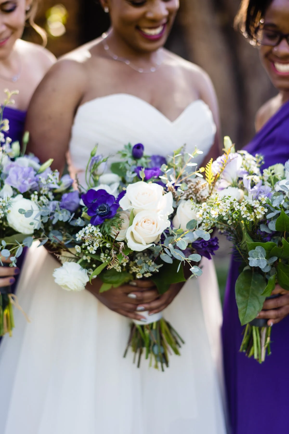 upclose image of a brides purple flowers