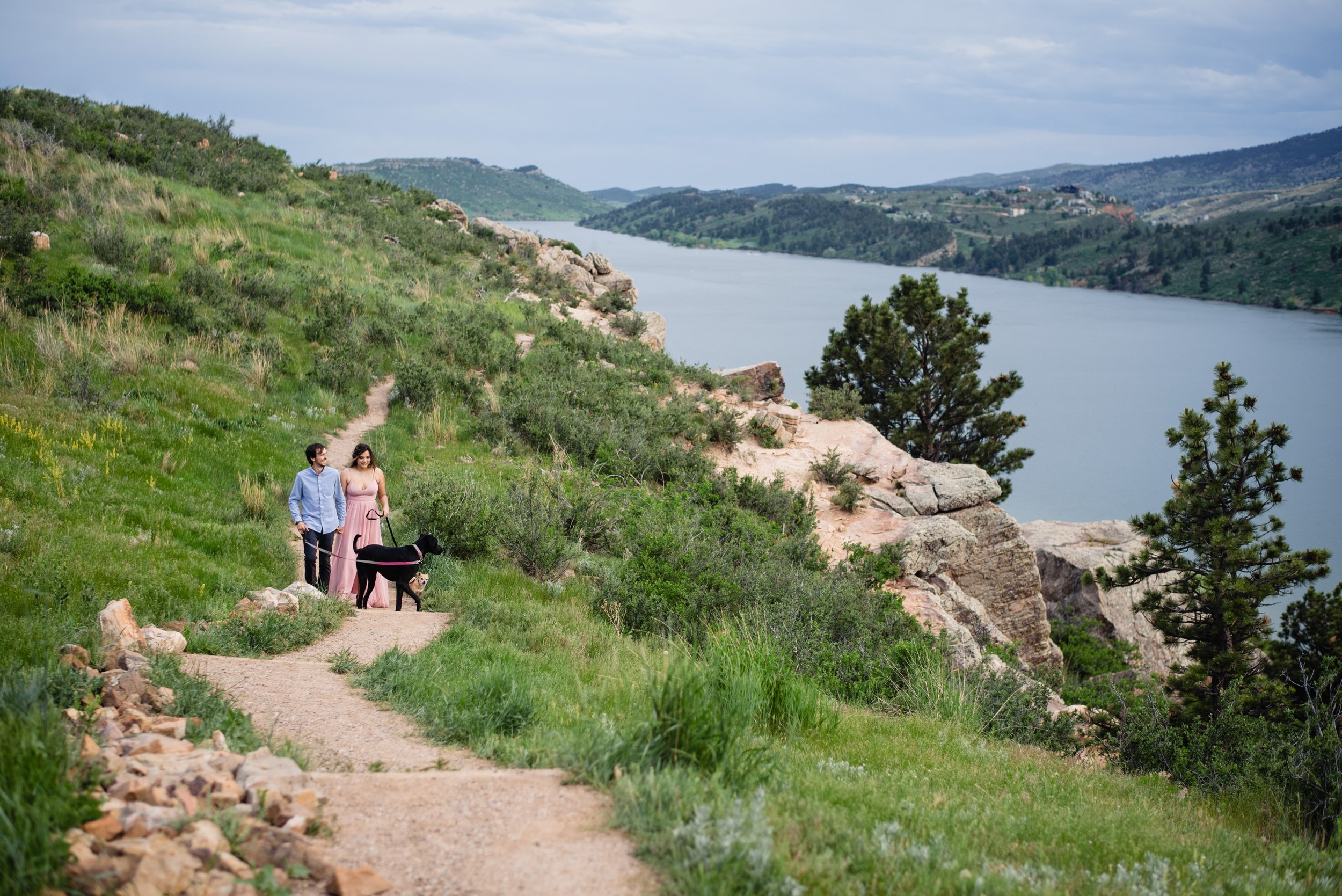 Couple walking their dog at Horsetooth Reservoir