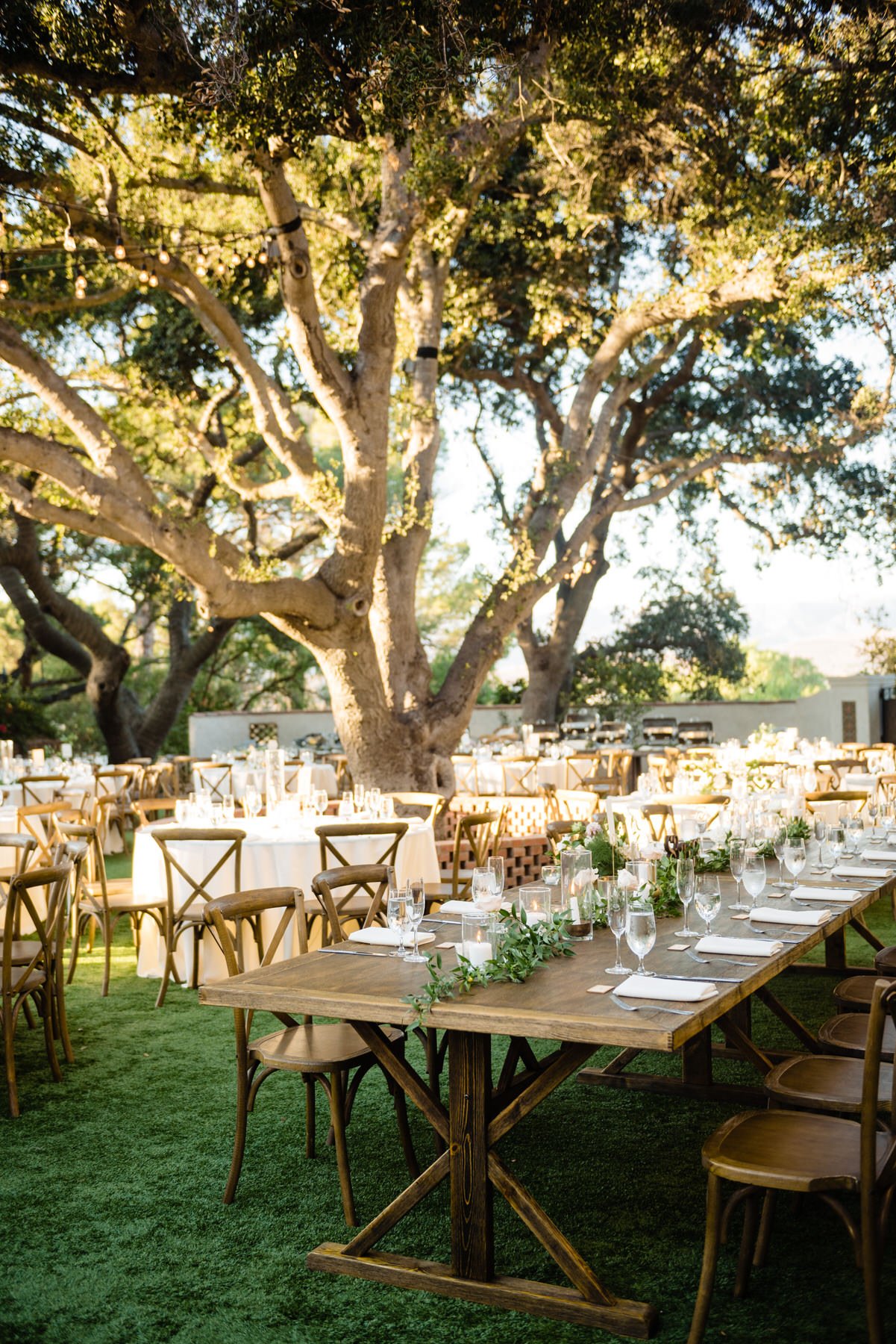 reception table setting with wooden tables at a Quail Ranch Wedding in Simi Valley, Ca | Jennifer Lourie
