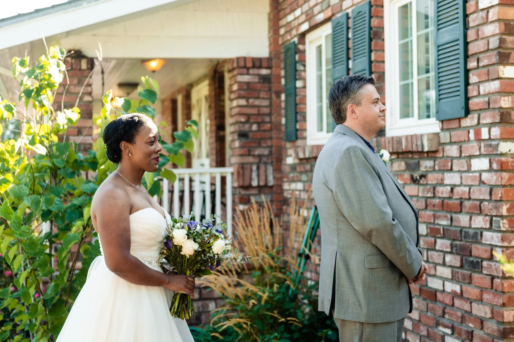 bride walks up to the groom during their first look at Lionsgate Event Center
