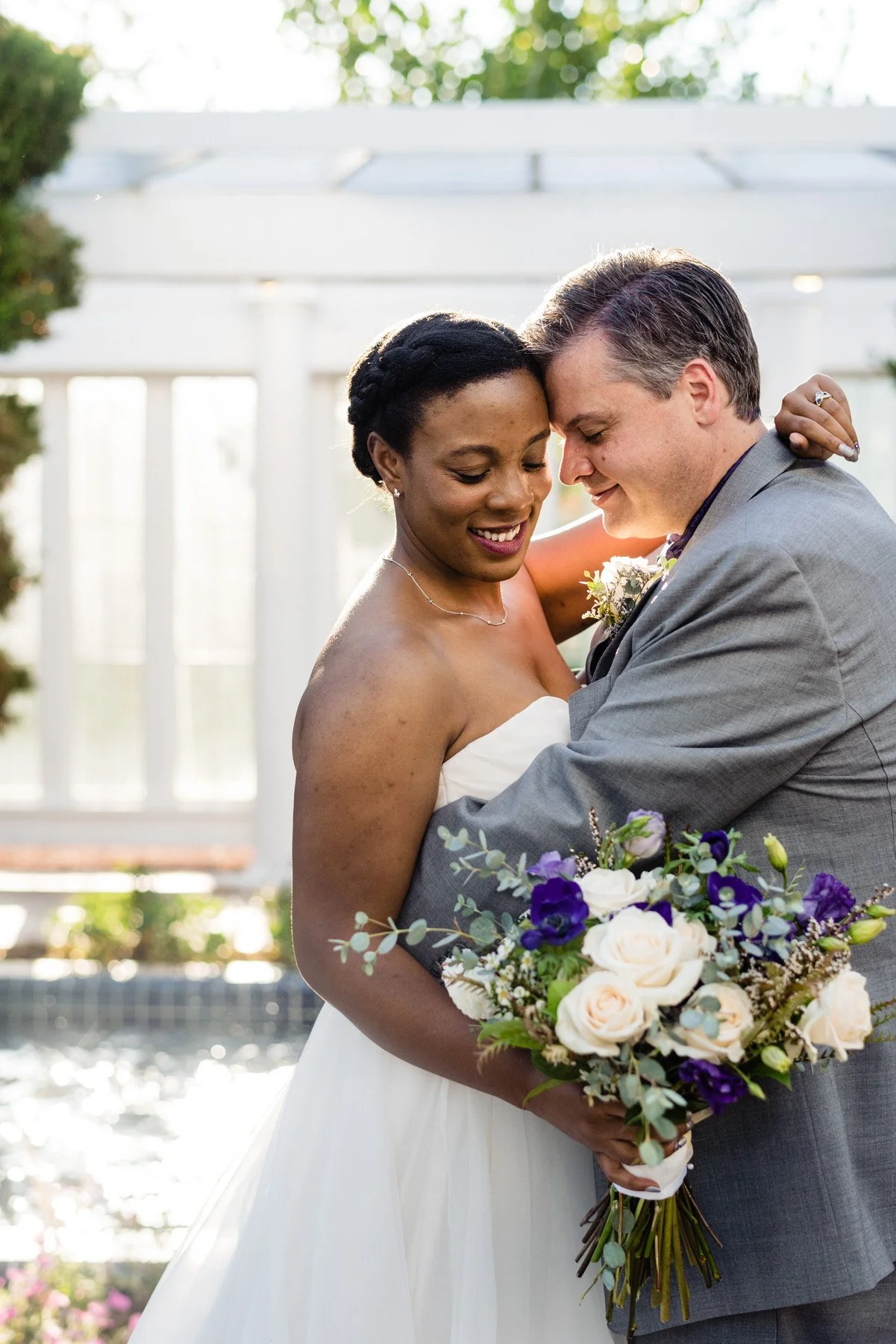 a bride and groom dance during their portrats at Lionsgate Event Center