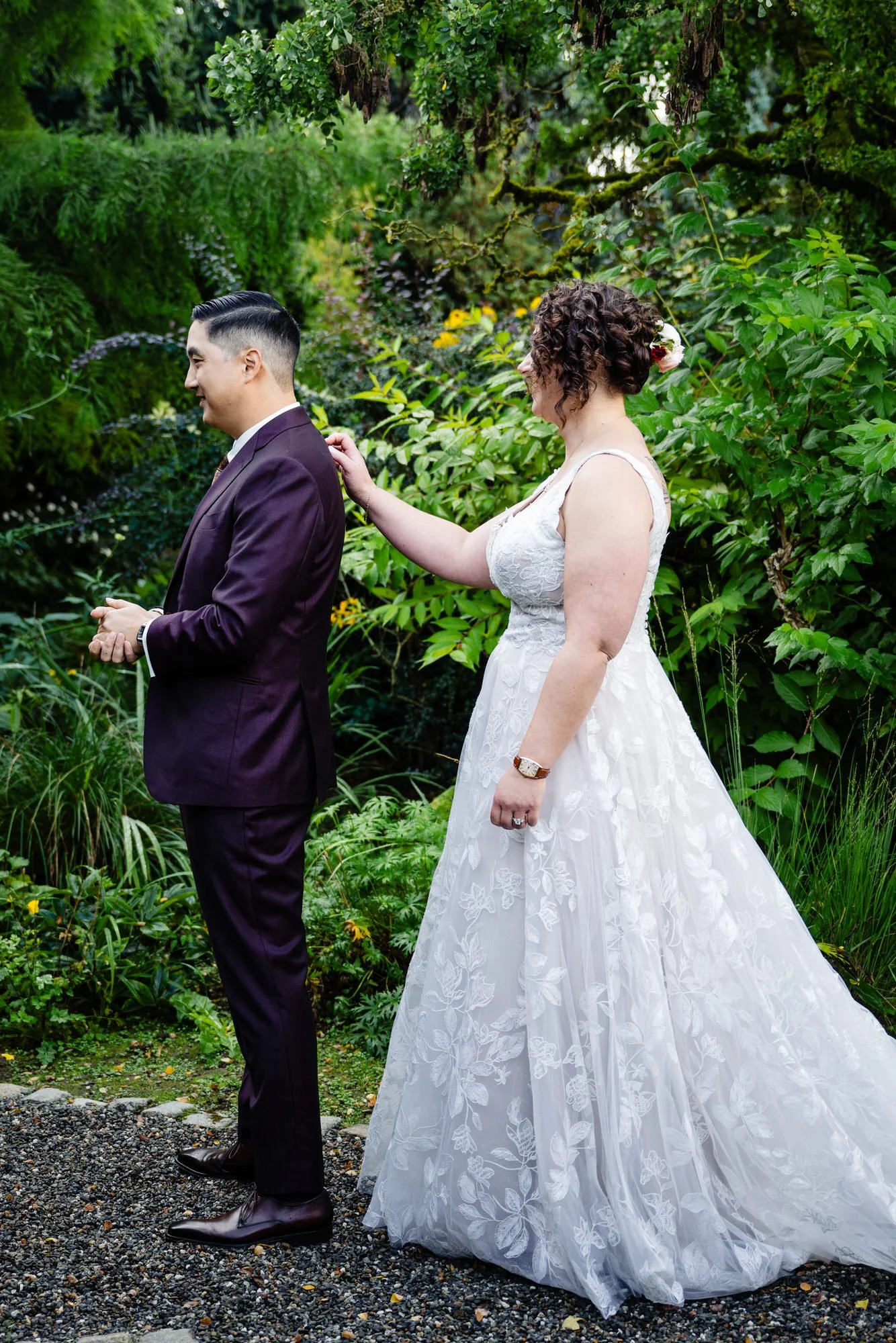 a bride walks up to her groom during their wedding day first look