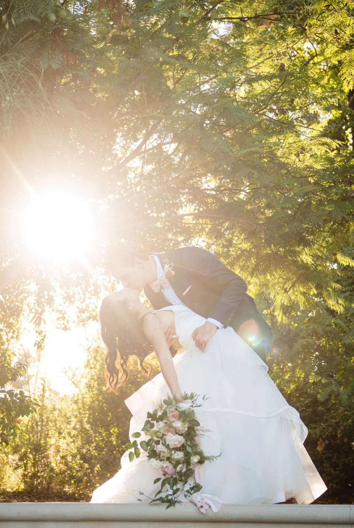 bride and groom kiss at a Quail Ranch Wedding in Simi Valley, Ca | Jennifer Lourie