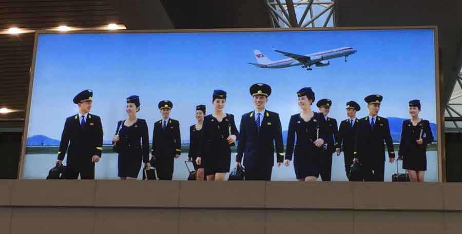 We took Air Koryo -- the DPRK’s only airline – from Beijing to Pyongyang. Though often mocked (some have called it the worst airline in the world (based on service , not on safety ), v it was clean and safe. Mid-tour we returned to the airport for a side-flight (Soviet helicopter charter circumnavigating the city!) and were treated to what was, hands-down, the best meal of the trip (come to think of it, the best meal I have ever had at any airport in the world!). An amazing 7-course Air Koryo lunch! (See source.)