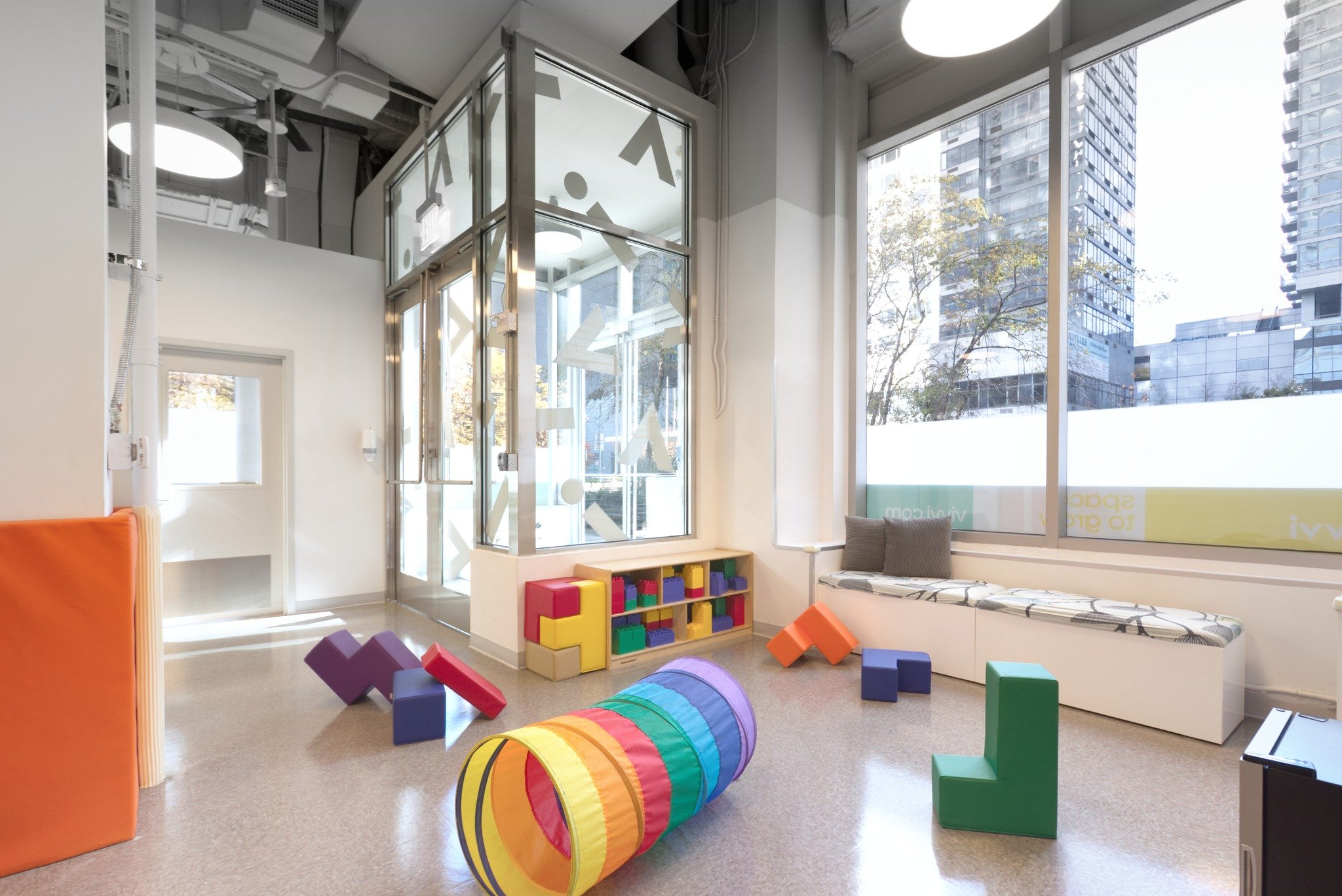 Time for school! At Vivvi Midtown West, we used our design know-how to make the most of the school&rsquo;s limited footprint. We programmed the entry space to allow children to exercise indoors. At times other than pickup and drop-off, the children e