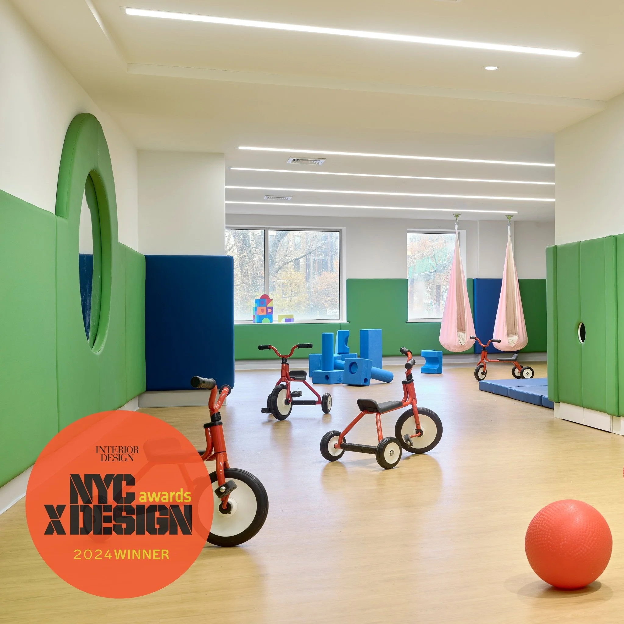 Where Play Leads to Learning! The movement room in our award-winning design for La Escuela Comunitaria del Bronx optimizes an irregular space. Connecting windows through the building, the large open room features daylight and plenty of space to play.