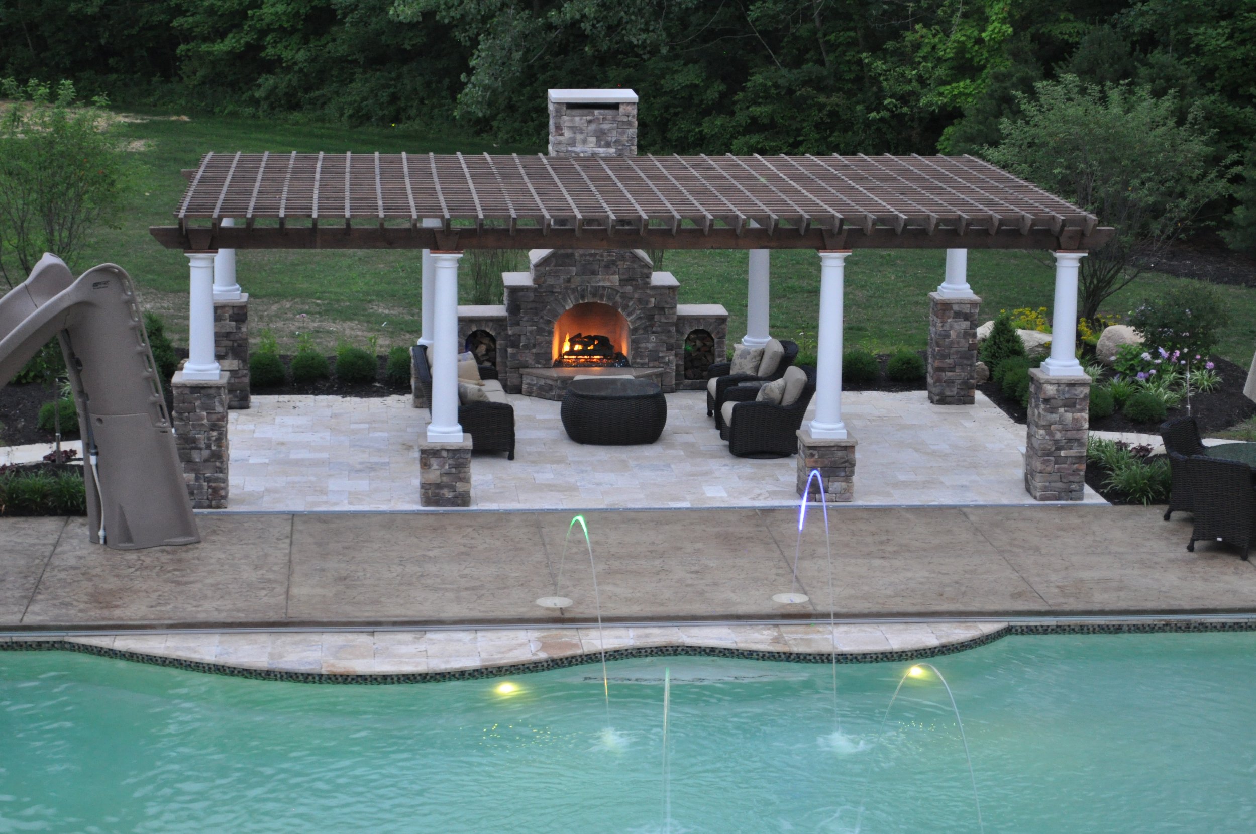 Custom pergola and outdoor fireplace .JPG