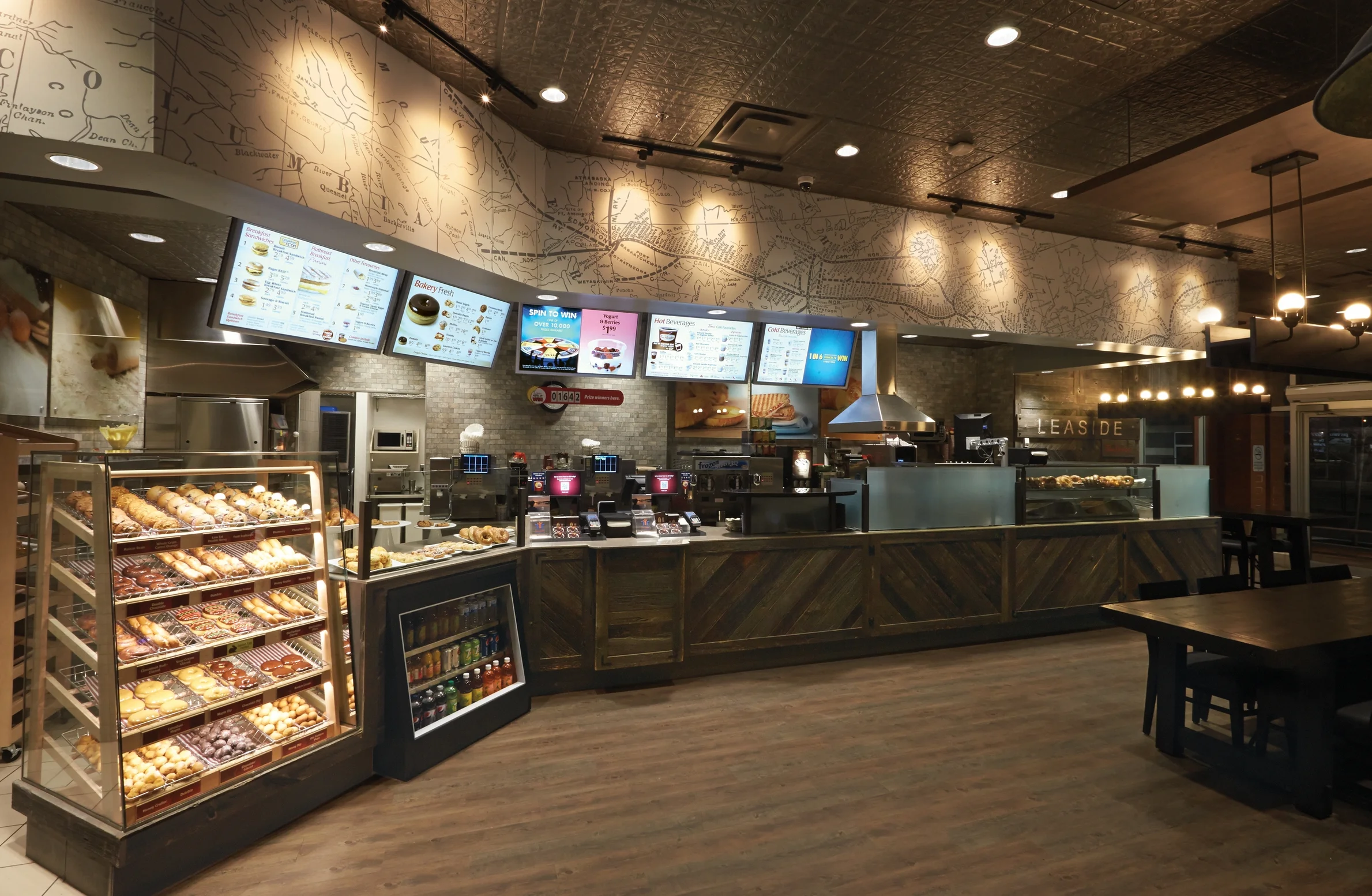  The bulkhead features a railroad map of a historic route for trains in Canada, with the Toronto (Leaside) stop featured at the far right. 