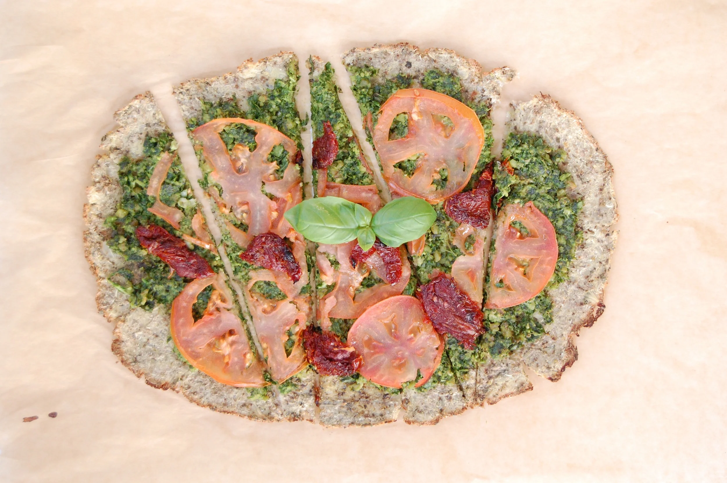 cauliflower crust pesto pizza