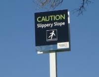 Auckland Council slippery slope sign