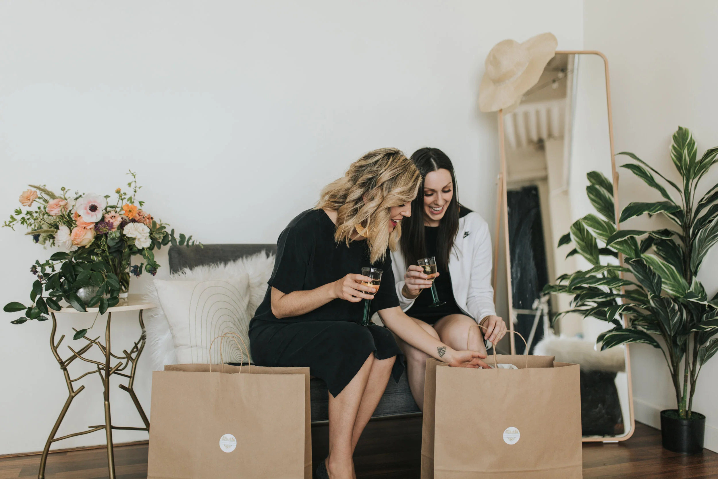 Jade & Shannon Looking in Shopping Bags 2.jpg