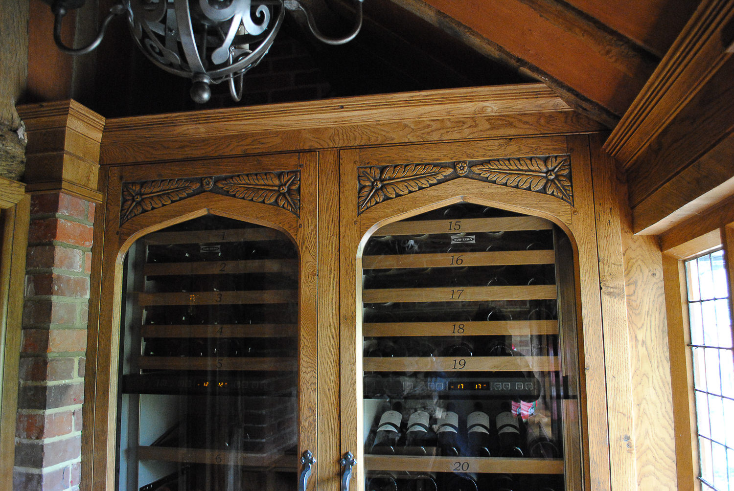 Bespoke wine room with Tudor style carving