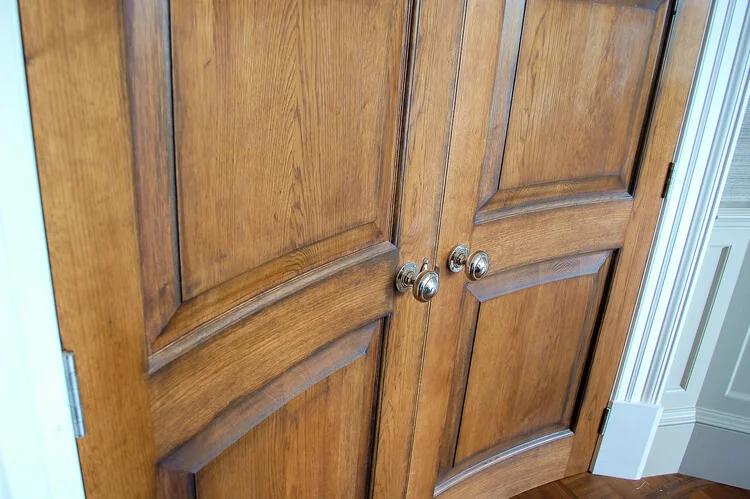 large curved panelled double doors made in solid oak.jpg