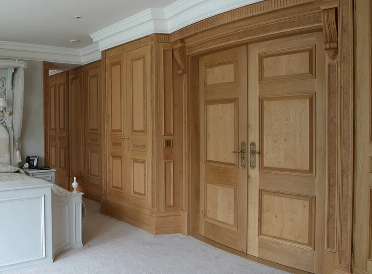Panelled bedroom including the curved double doors.jpg