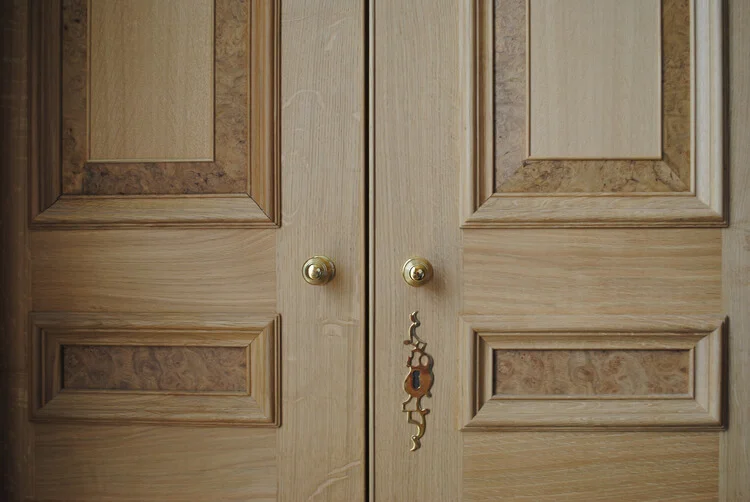 Wardrobe doors with walnut burr fielding.jpg