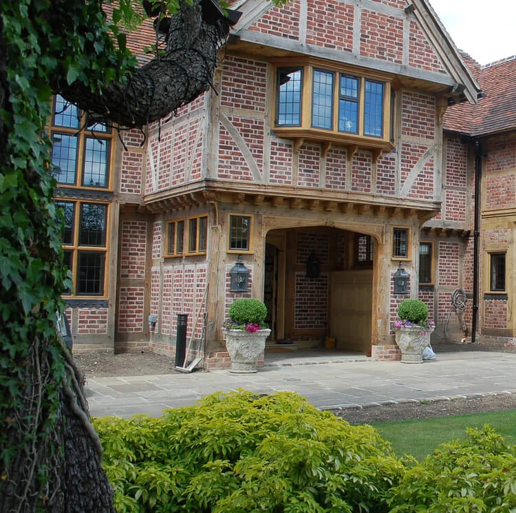 Timber framed extention of a period property with new porch panelling.jpg