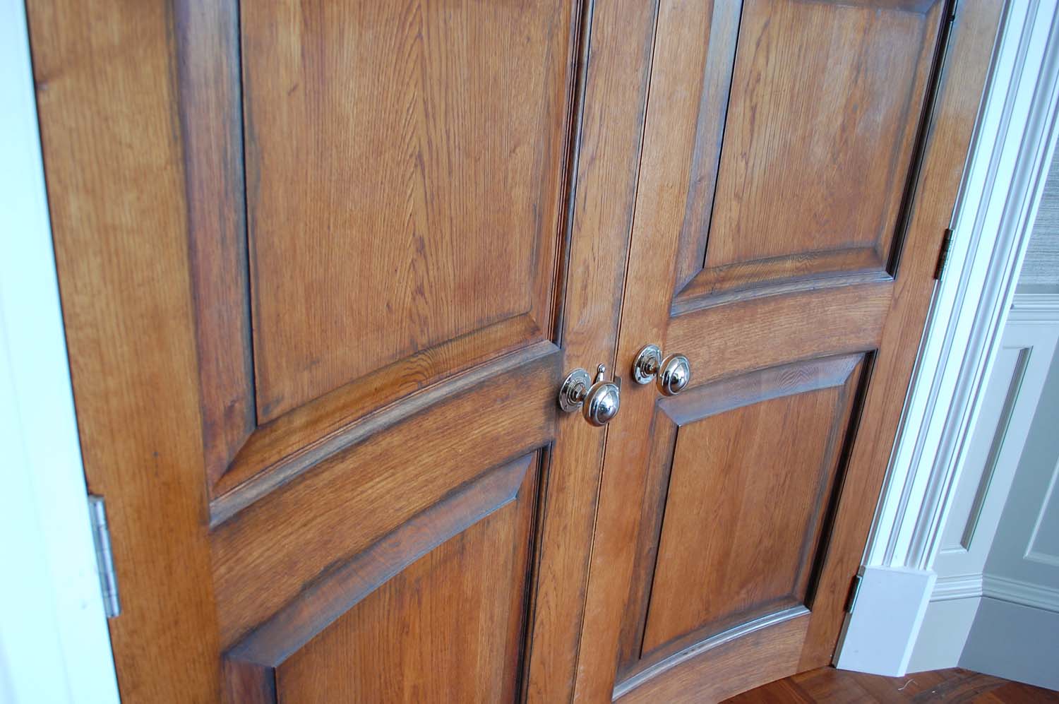 Curved oak panelled double door 