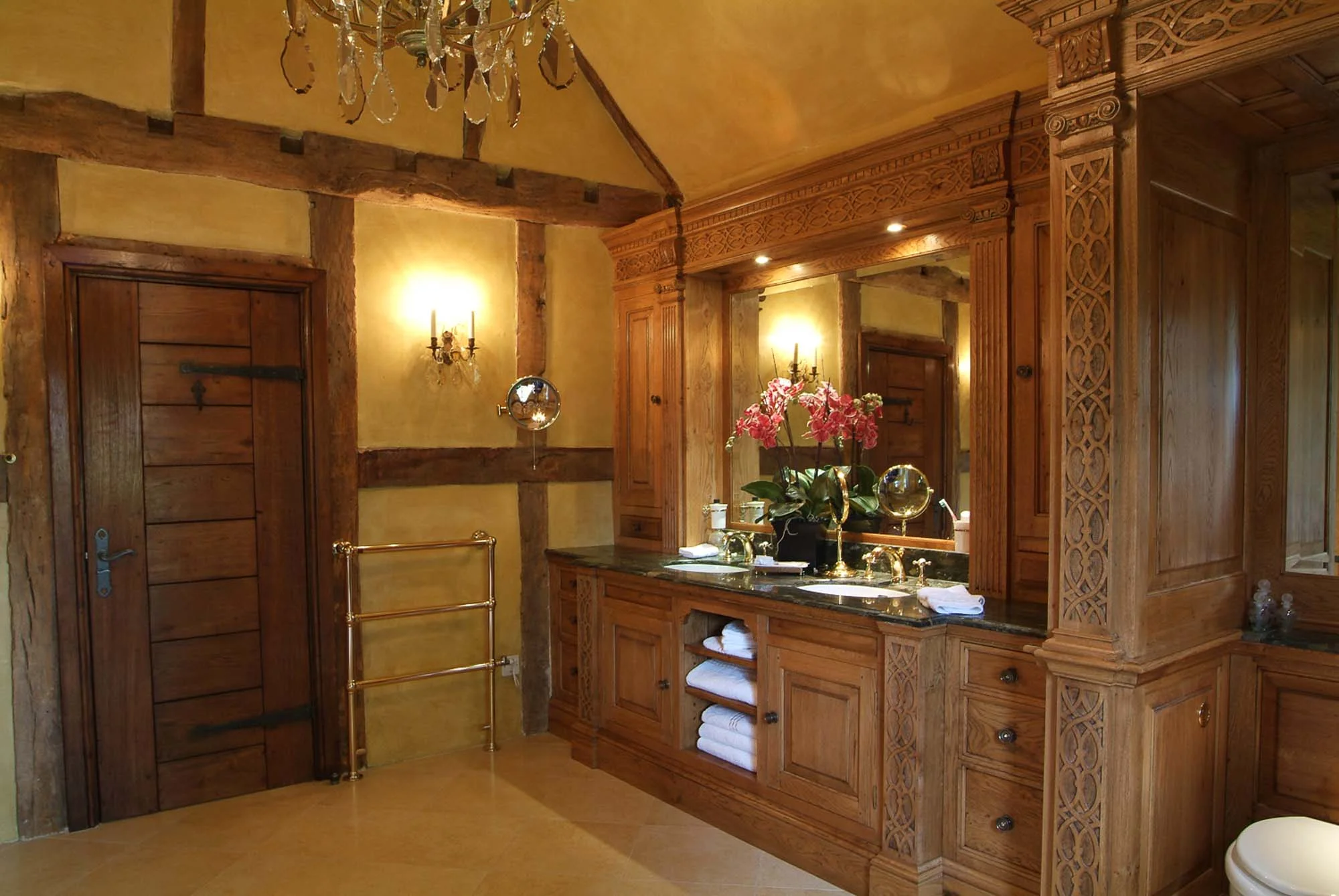 Oak Panelled bathroom with double sink vanity cabinets.jpg
