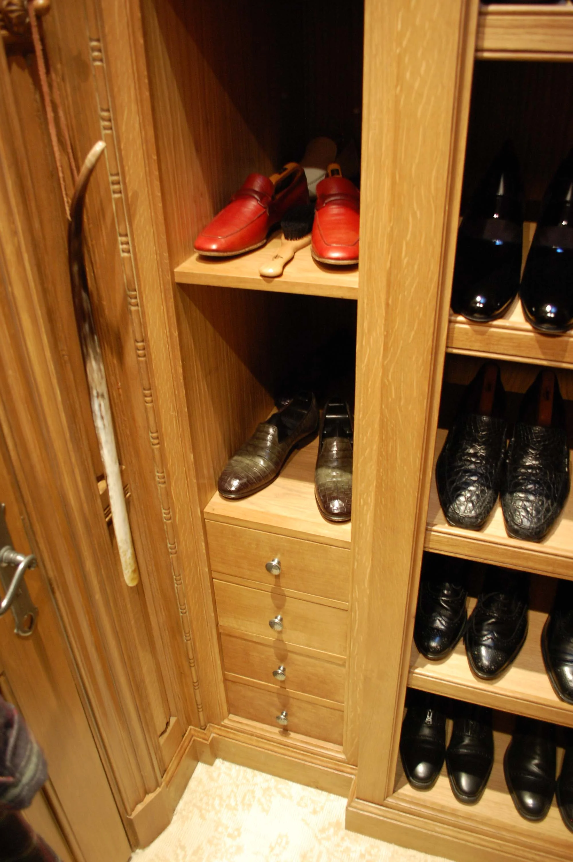 Bespoke shoe storage and panelled room.JPG