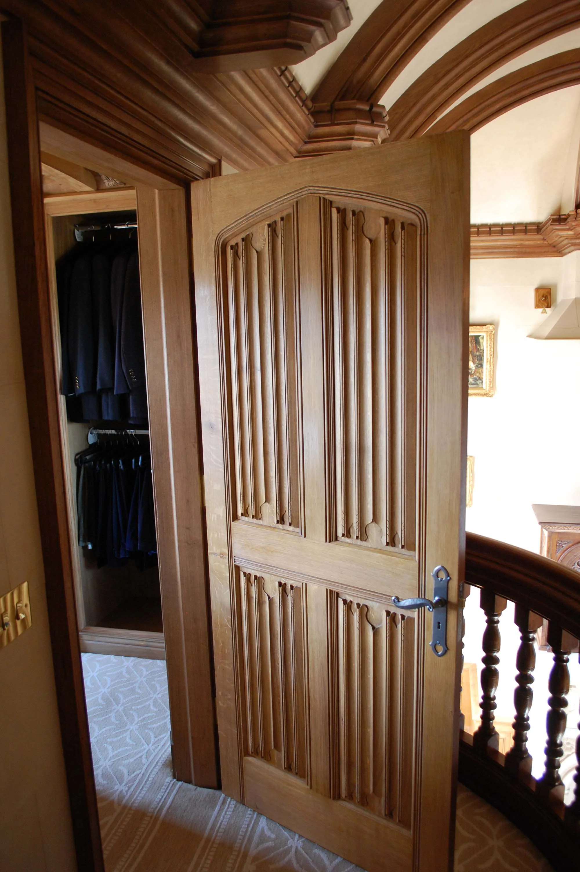 Hand carved  Linenfold oak panelled door with authentic 16th and 17th century style mouldings.JPG