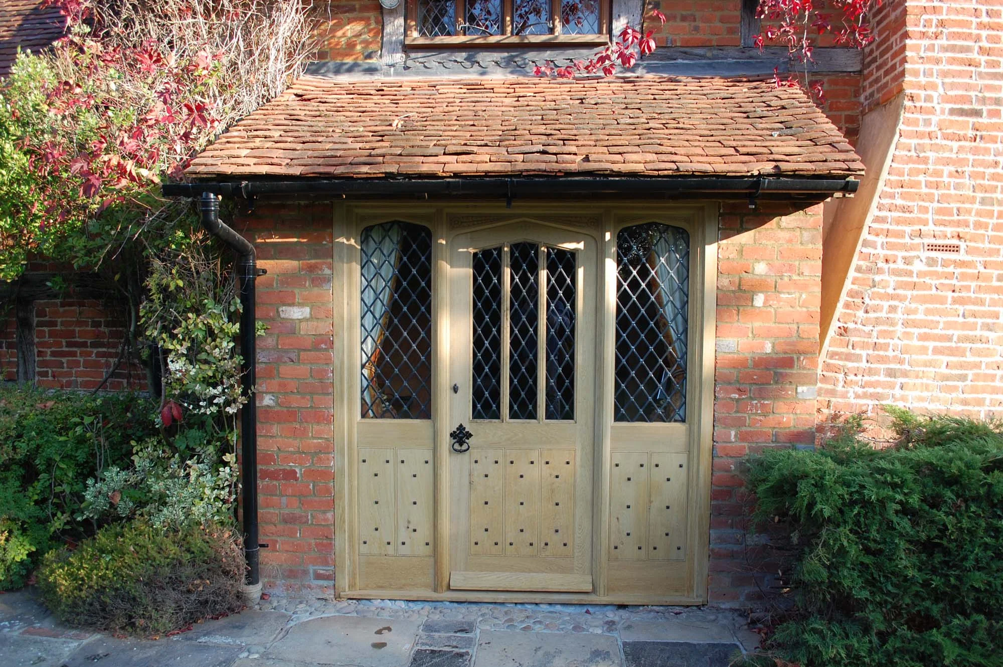 Gothic style oak door and side lights.JPG