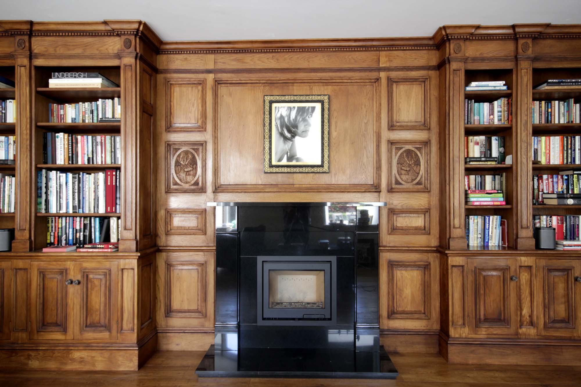 Georgian style oak panelled fire surround and carved panels