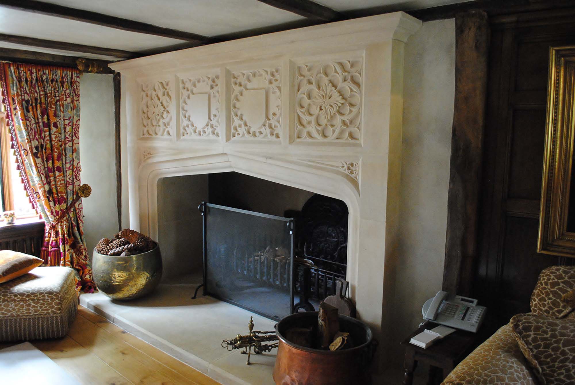 Large full height Gothic style fireplace made in Portland stone