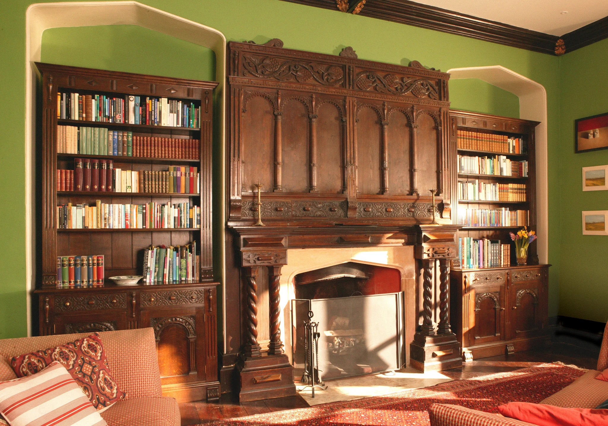 Jacobean style bespoke library cabinets and solid oak cabinetry