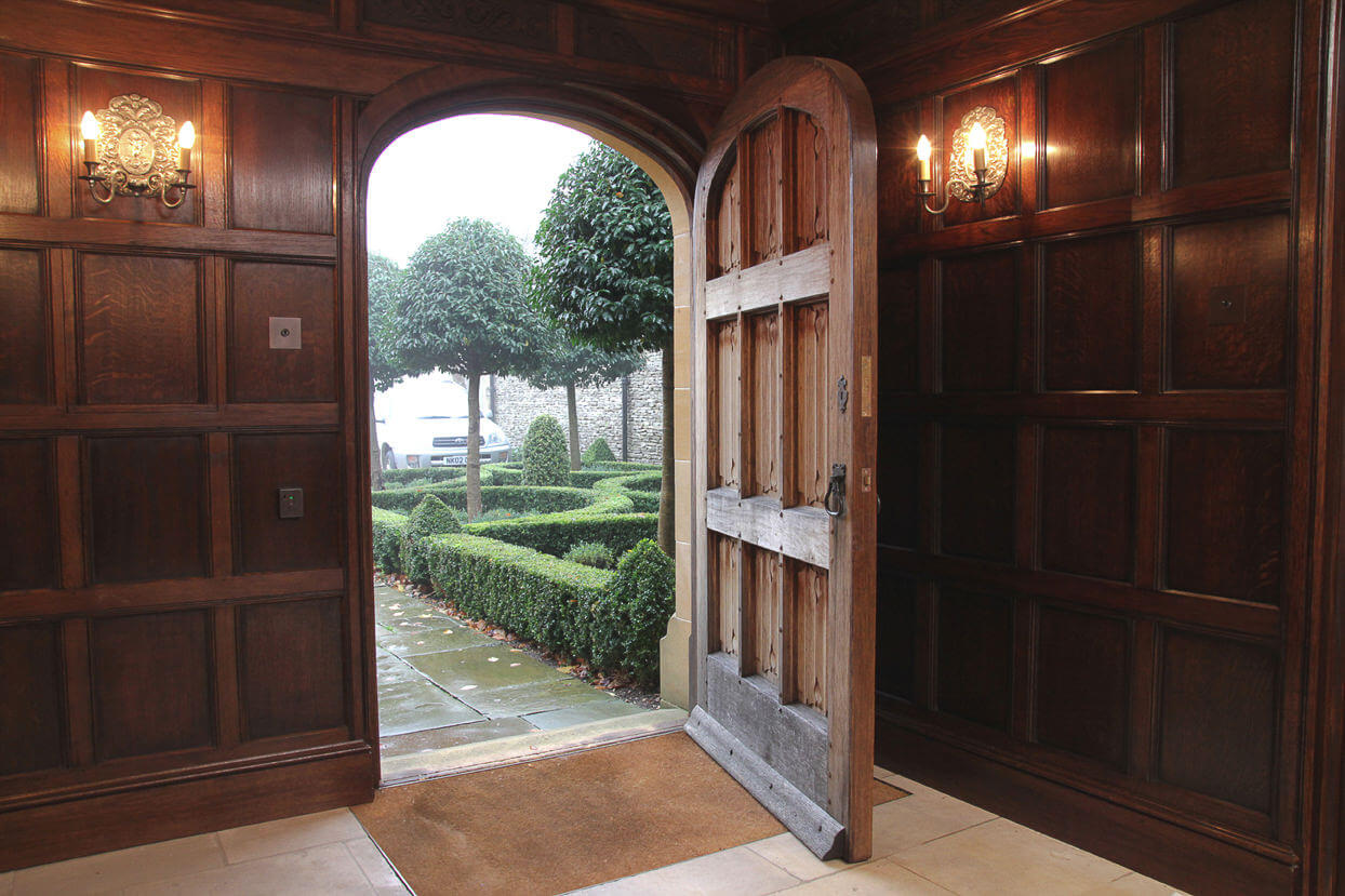 Bespoke Period Joinery Oak Panelled linenfold door and 16th Century style panelled Room