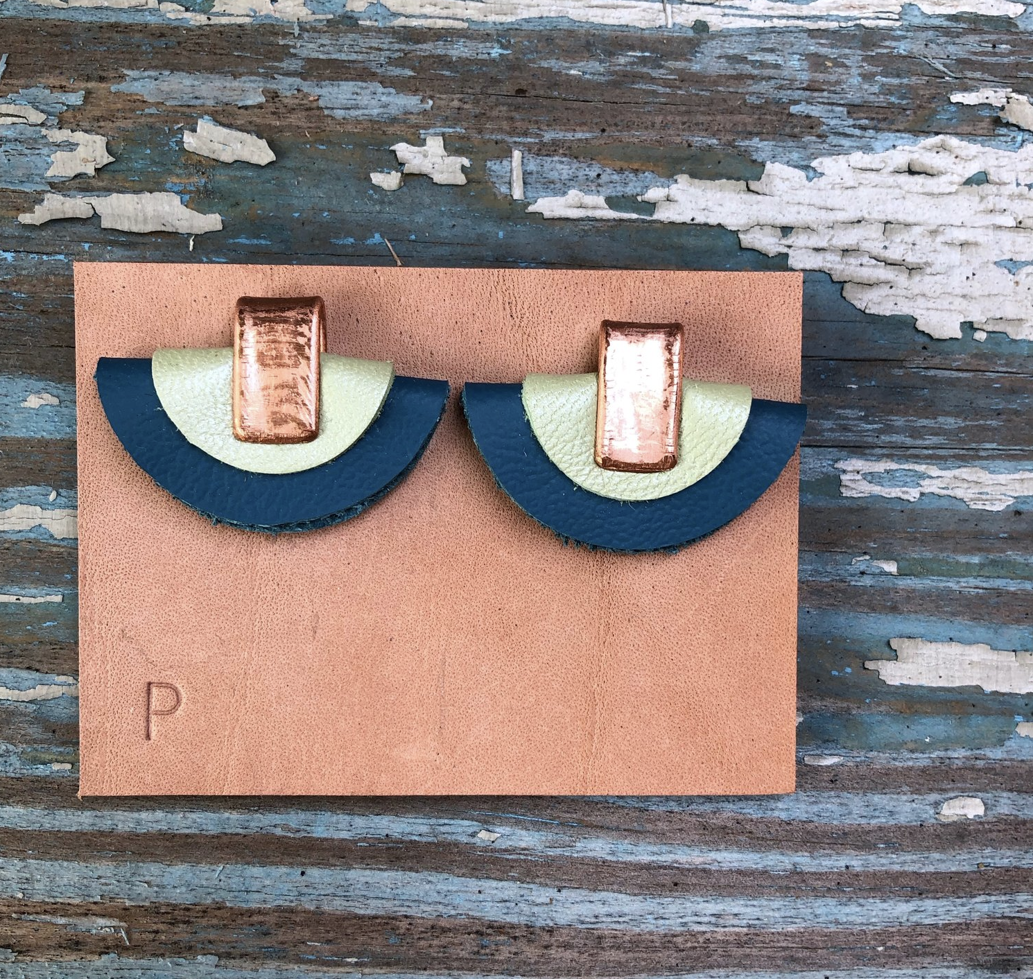 Leather earrings by Penelope Design Studio