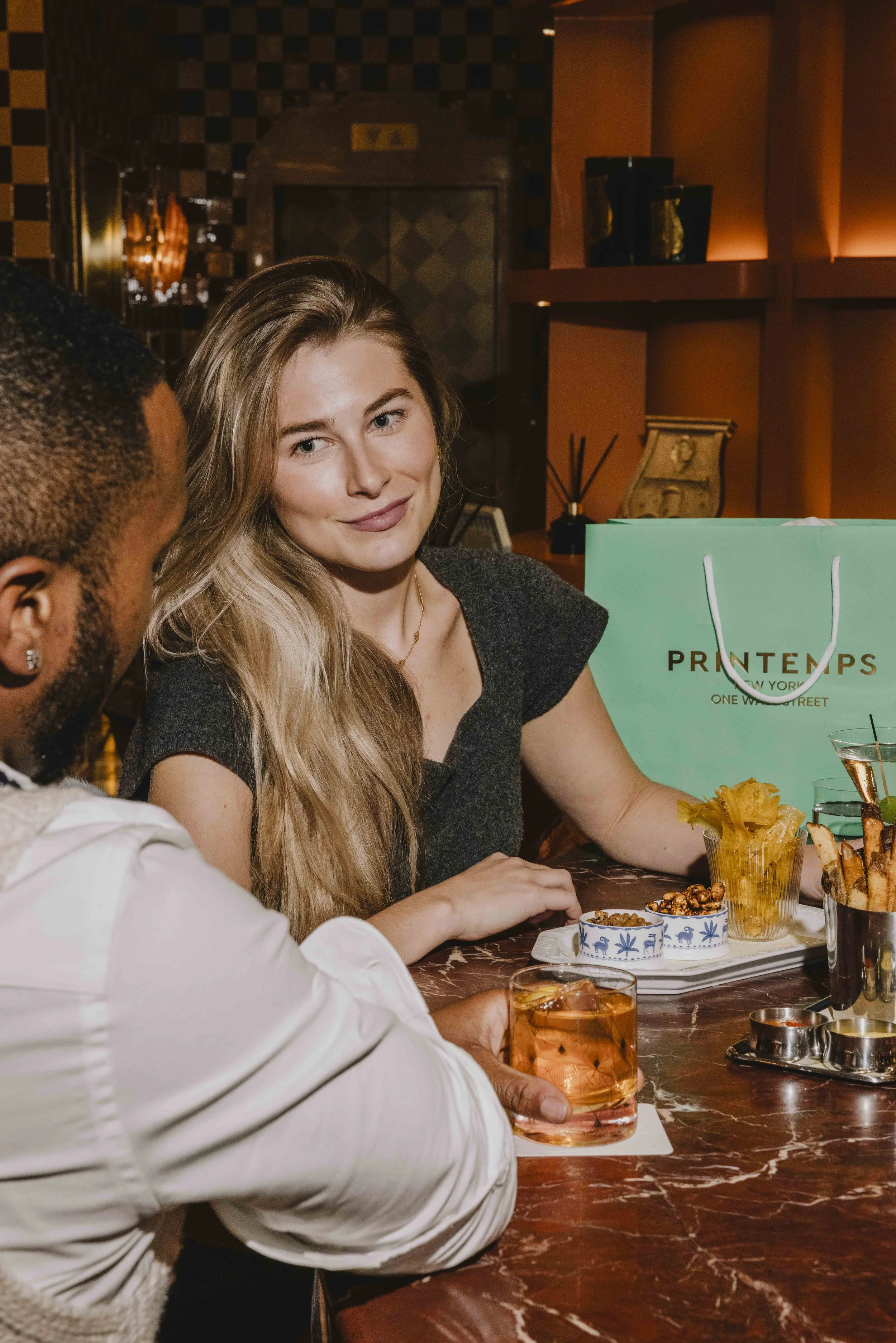 couple-at-bar-with-cocktails.jpg