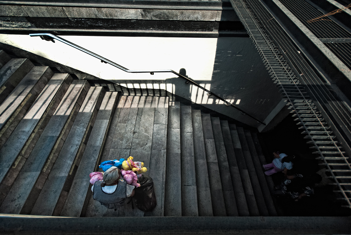 Vendor on stairs