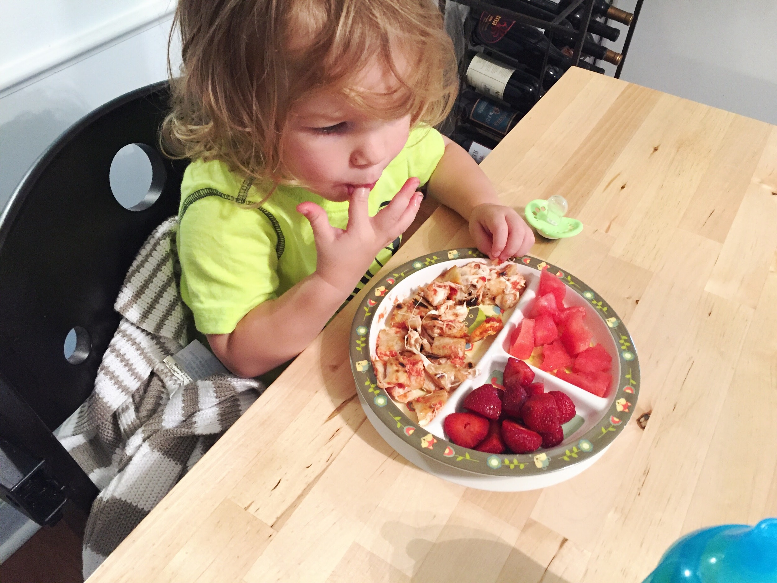 A rare quiet moment- he had his three favorite foods: Pizza, Strawberries, and Watermelon