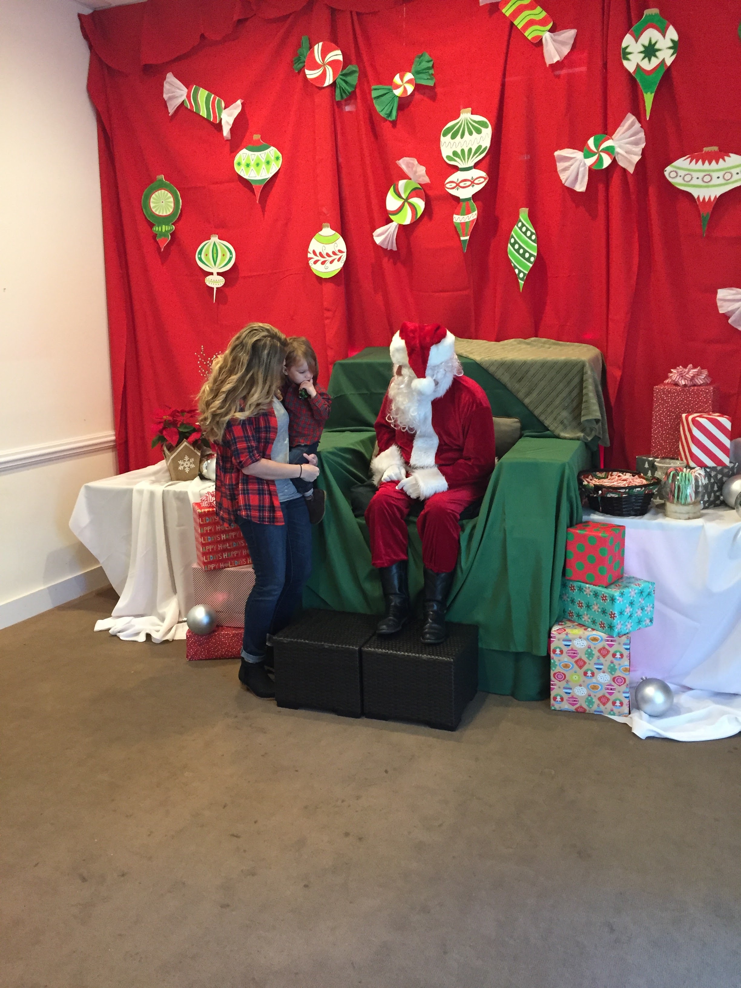 Telling Santa his Christmas wishes!