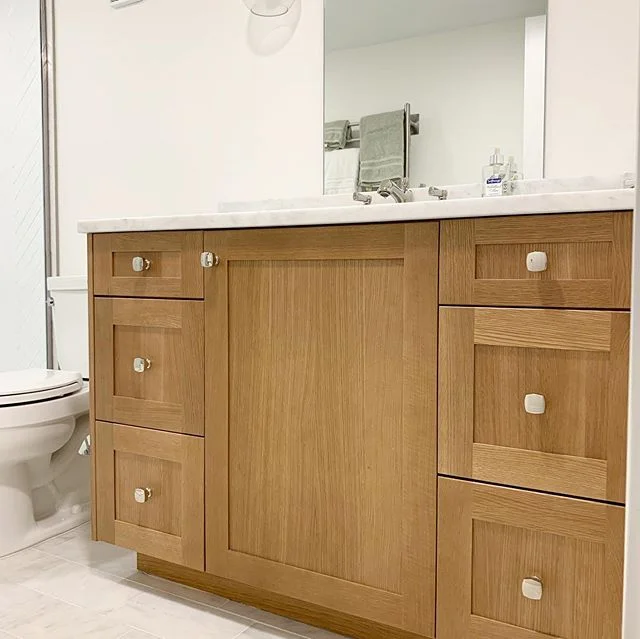Love us some rift cut white oak and polished nickel hardware topped off with marble counters. Nice condo project wrapping up.