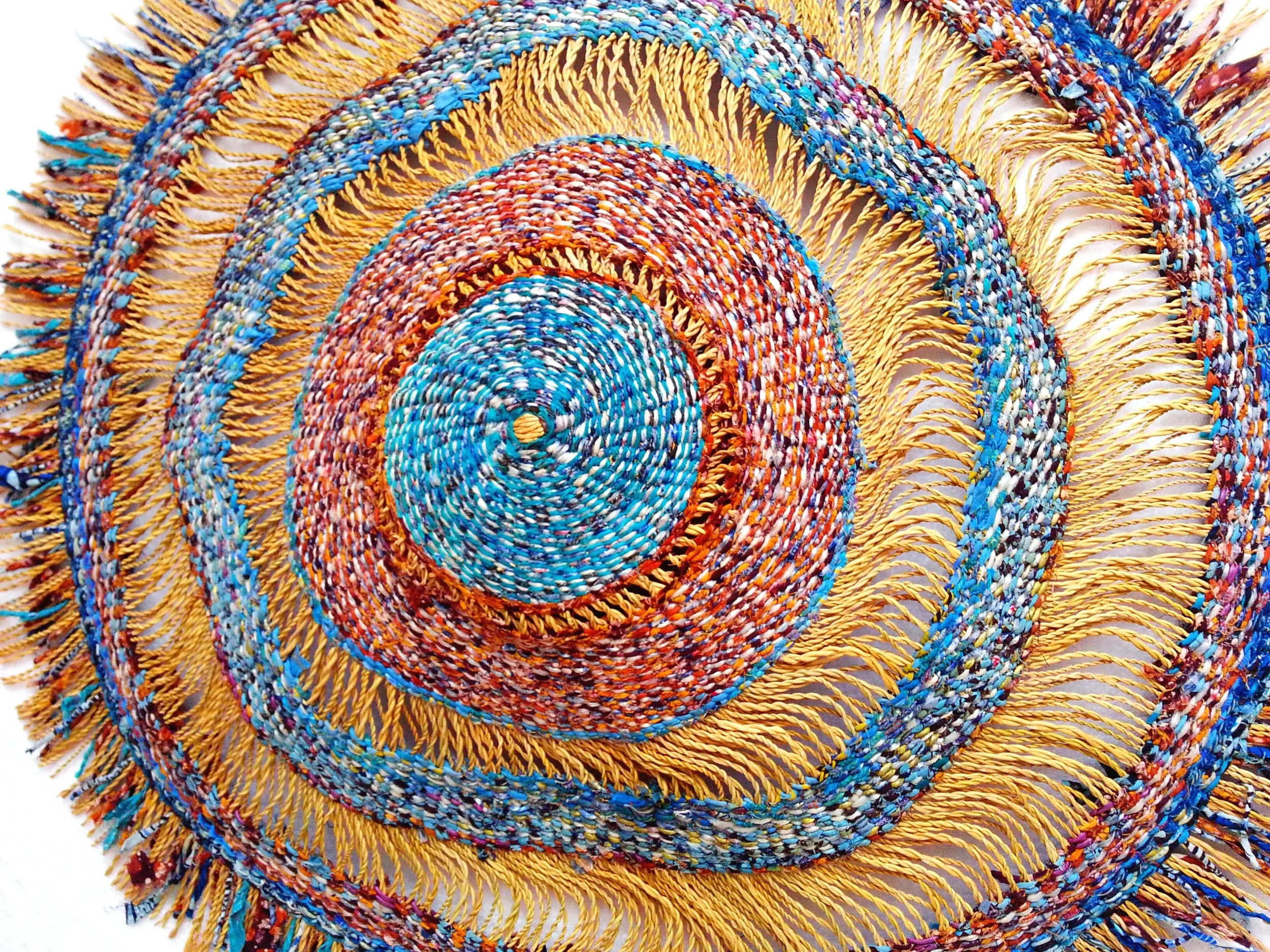 Detail of recycled cloth and plastic piece.jpg