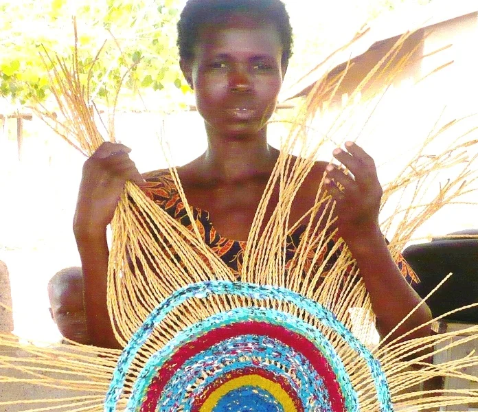 07 - Atoore and her first recycled fabric piece - Copy.jpg