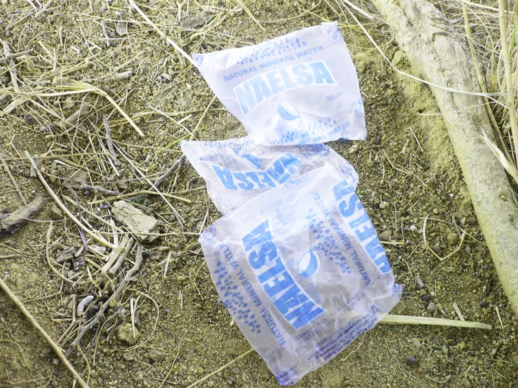 These are the pure water plastic bags we recycle into every basket and wall art hanging