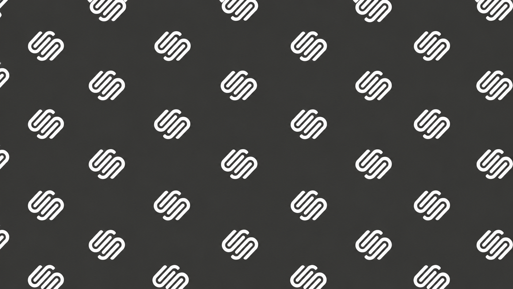 Charcoal Grid of White S Monograms.png