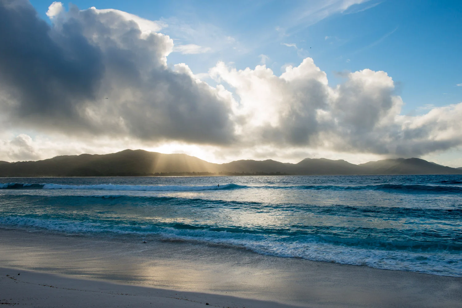 Indian Ocean and Praslin island at dawn, Cousin Island Special Reserve, Seychelles