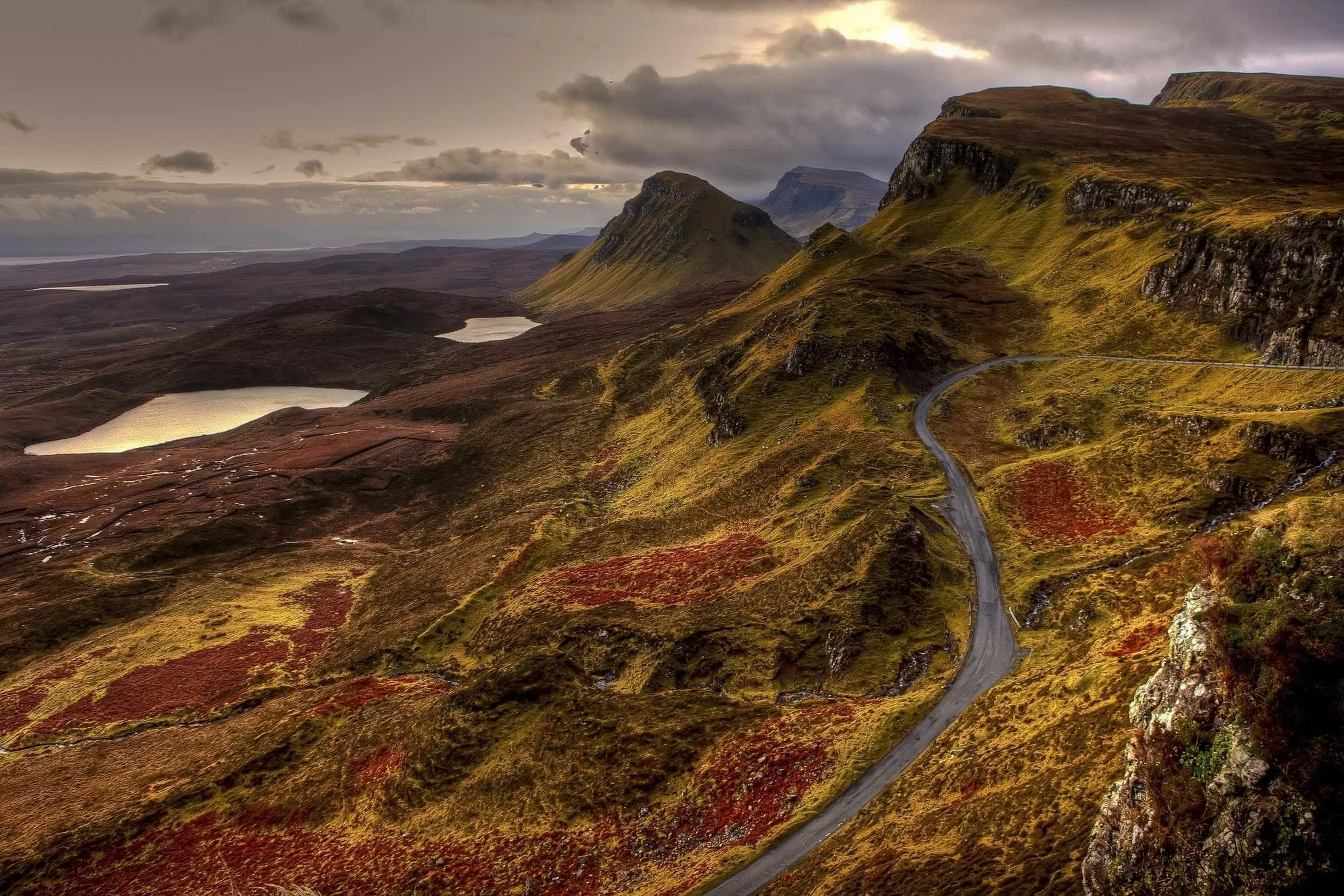 Scottish highland hills and loch at sunset