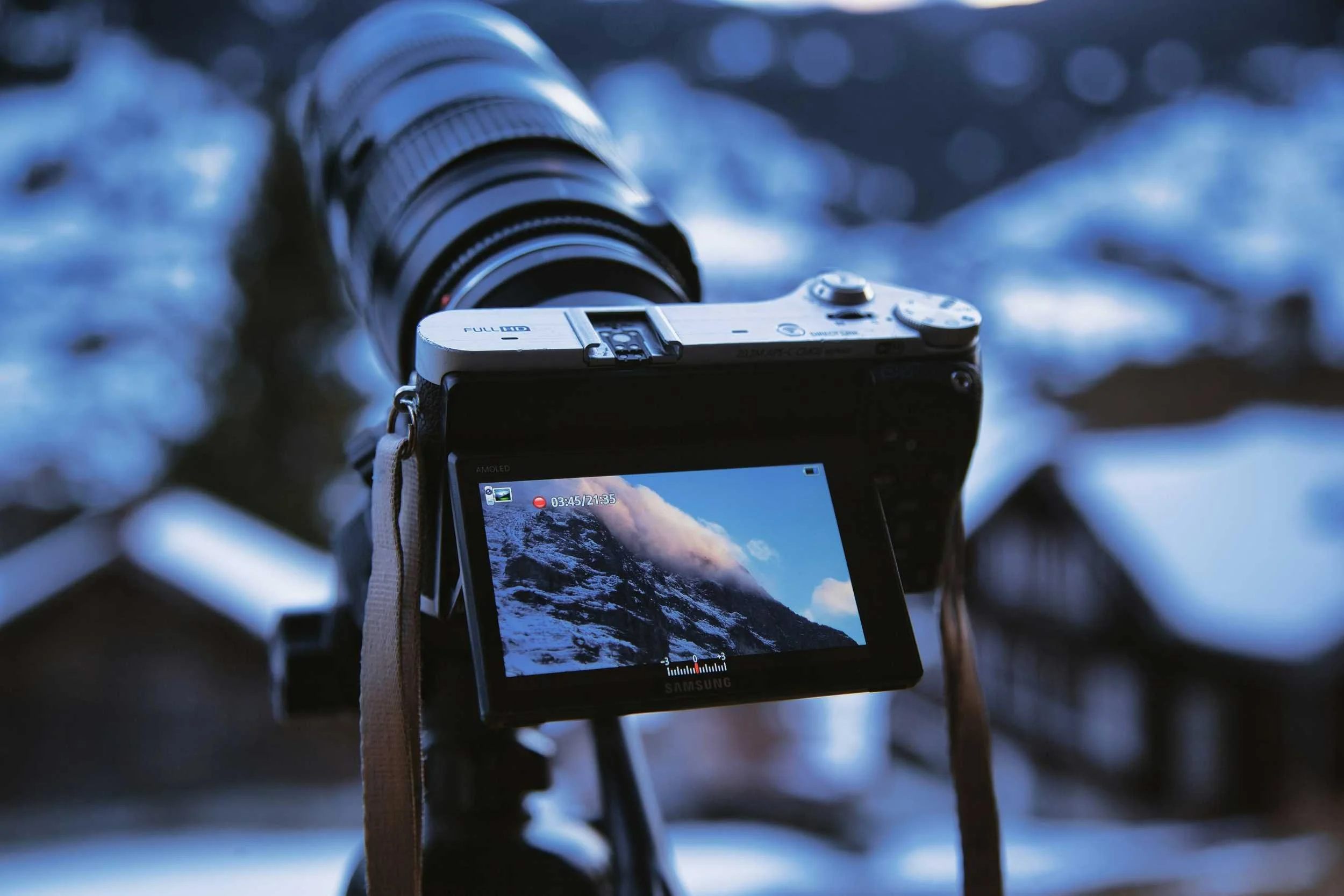 Camera tripod snow mountain