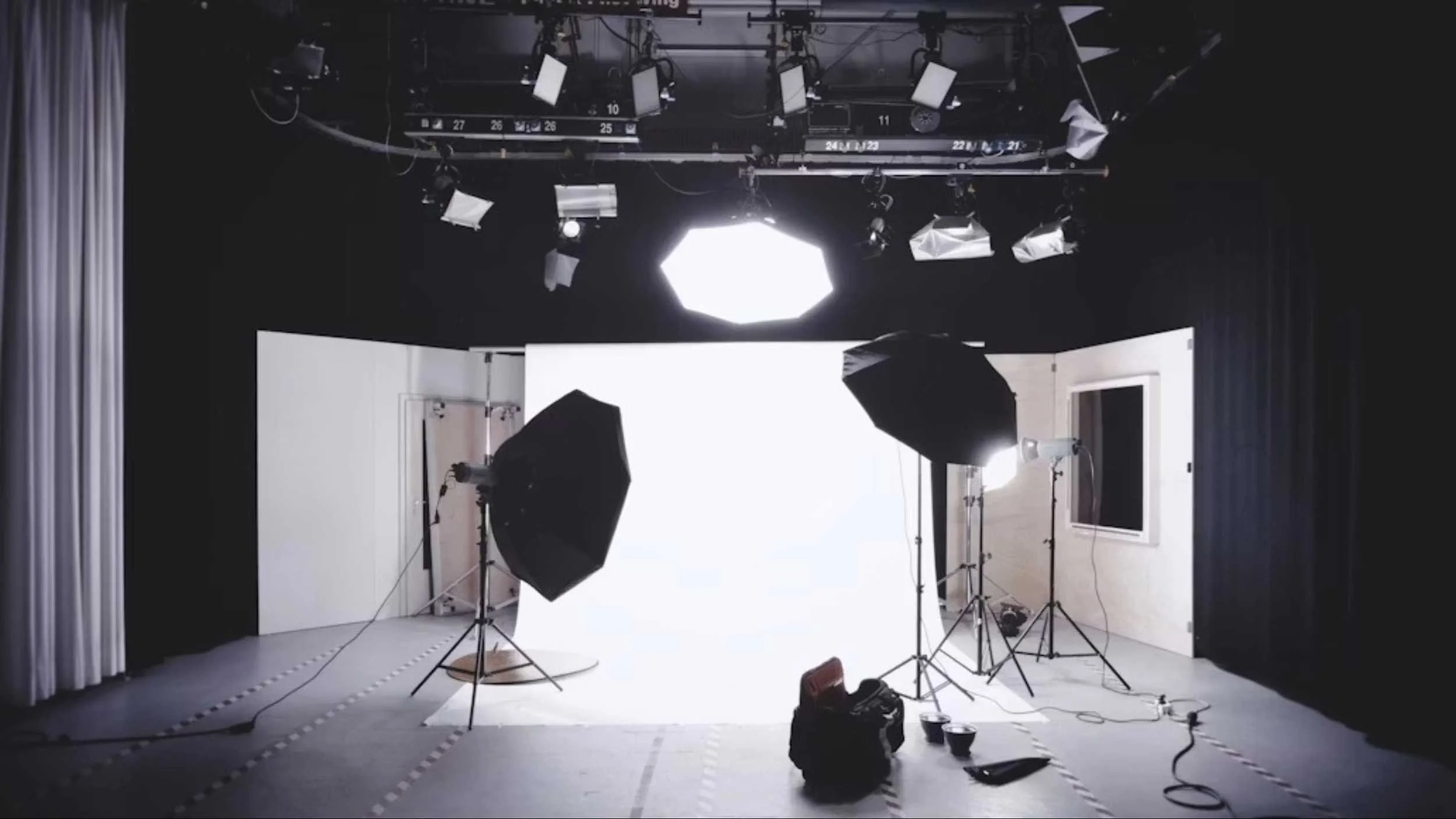 Photography studio with lights and backdrop