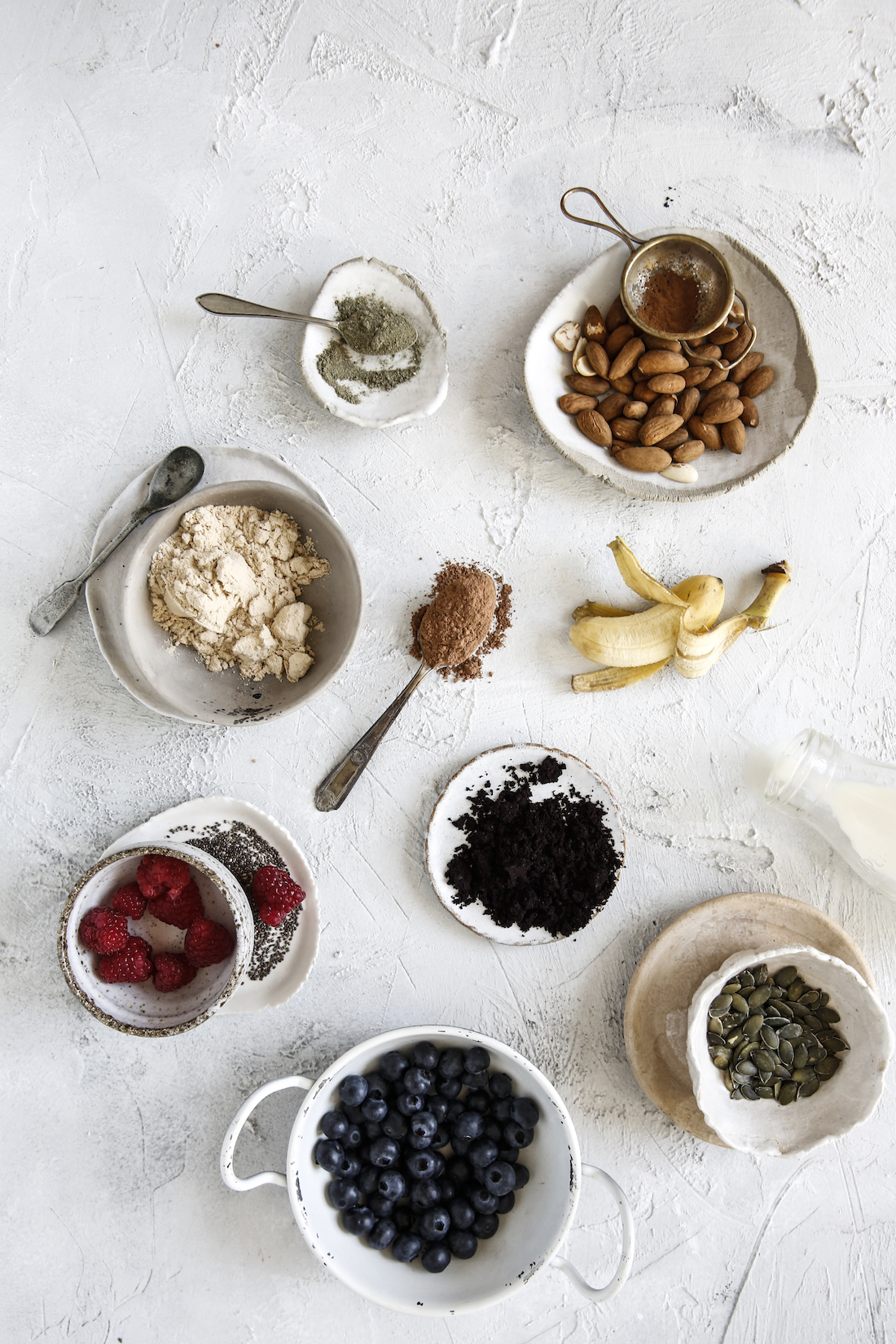 Berries, chia, nuts, Vital greens, protein powder, bananas, cacao &amp; seeds. All amazing things to keep in the pantry for smoothies, breakfast bowls &amp; snacks during the day. 