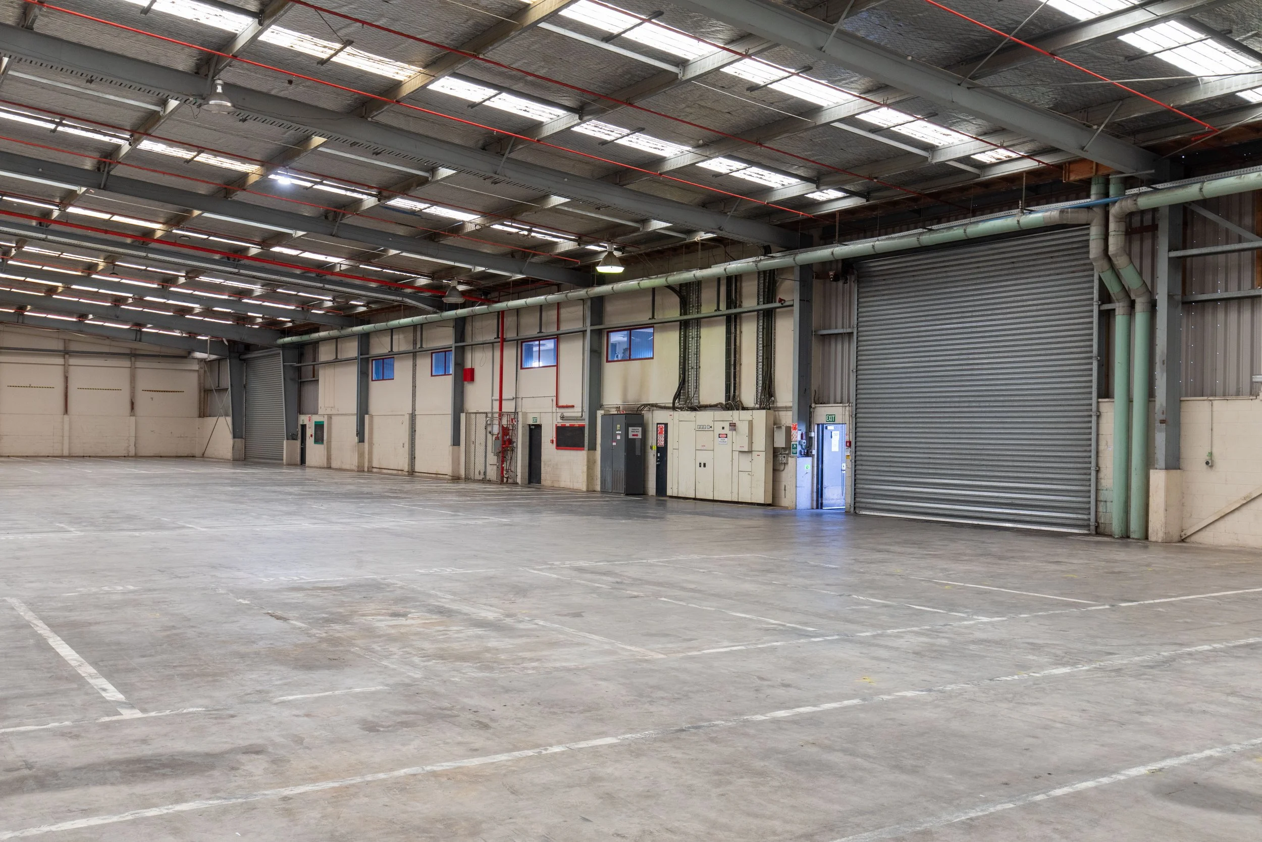 Warehouse interior showing large roller door