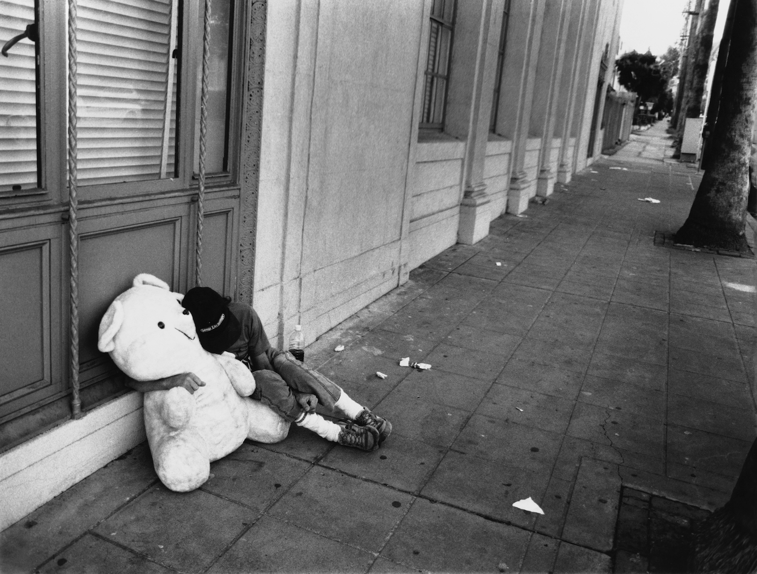 homeless wit teddy bear.jpg