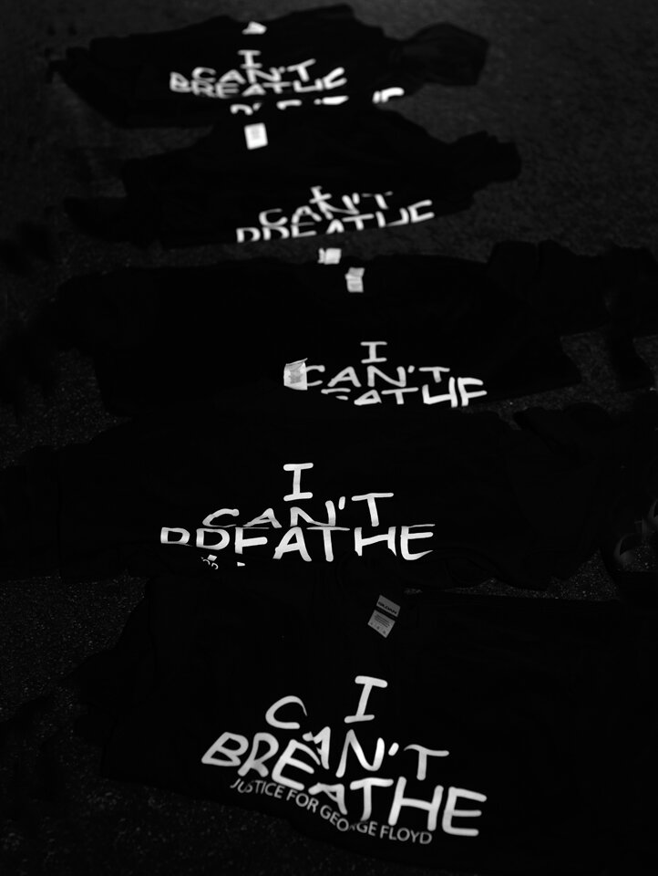  GEORGE FLOYD PROTESTS  "I Can't Breathe" tees for sale arranged on the ground outside City Hall during the mass BLM demonstrations. 