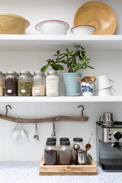 open shelving organization in kitchen.jpg