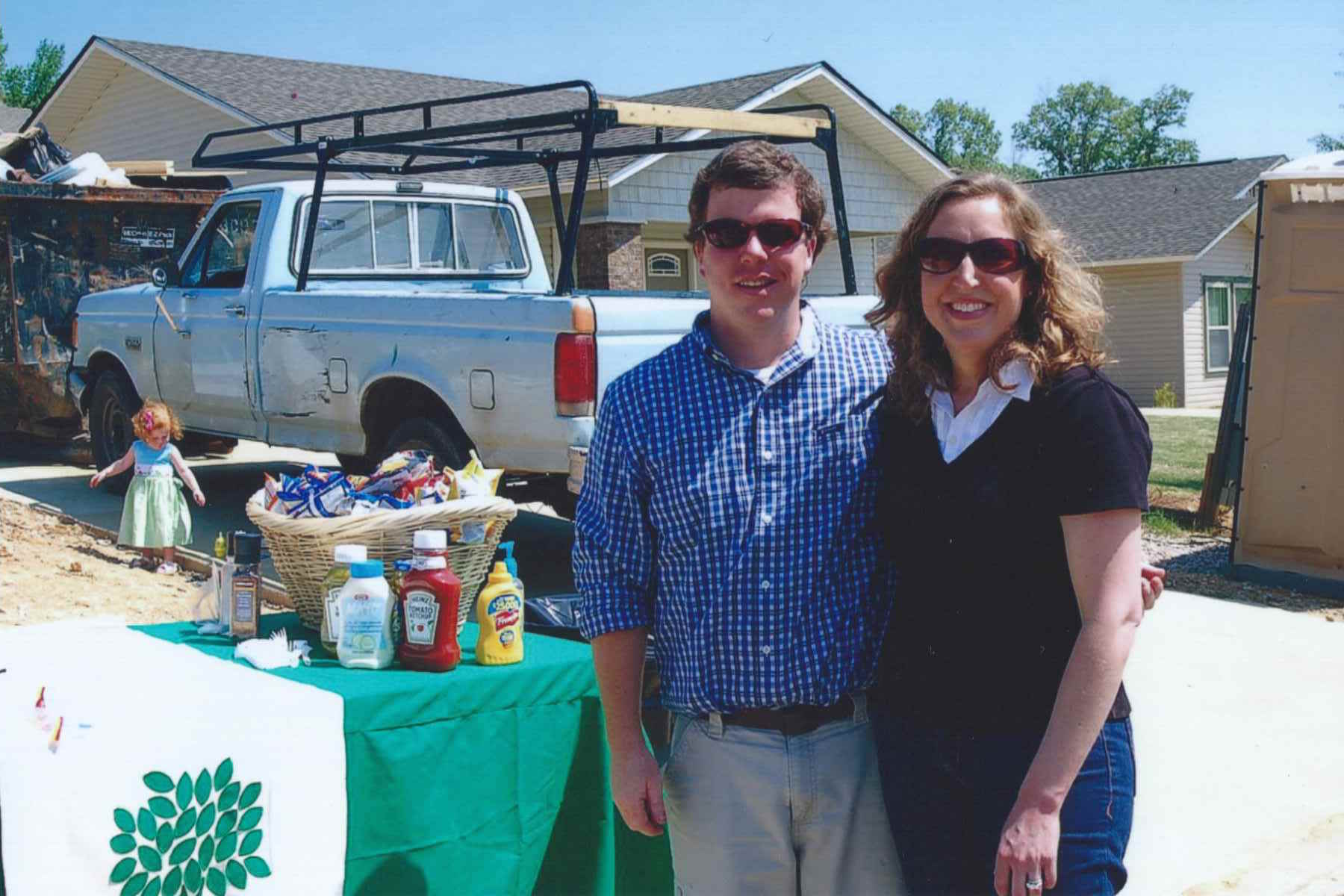 Elliott and LeArden serving lunch to volunteers at a Habitat Build, 2010